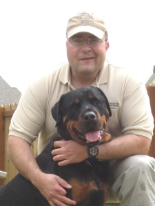 Troy and one of his rottweilers, Bradum